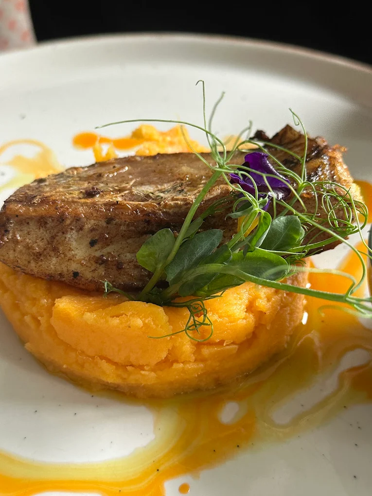 Seared fish with mashed squash