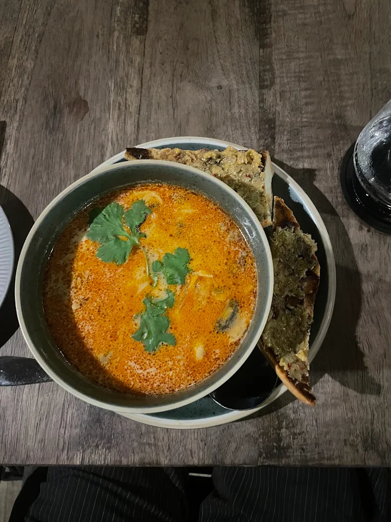 Tom yum soup with toast